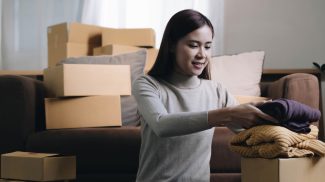 Business Start up SME concept. Young startup entrepreneur small business owner working at home