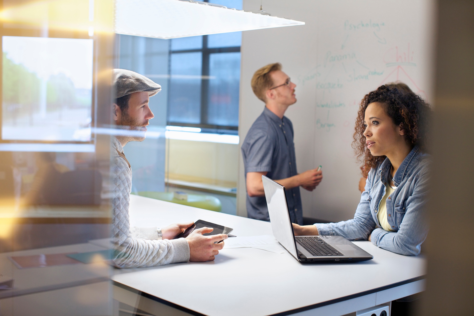 Business team discussing ideas at meeting