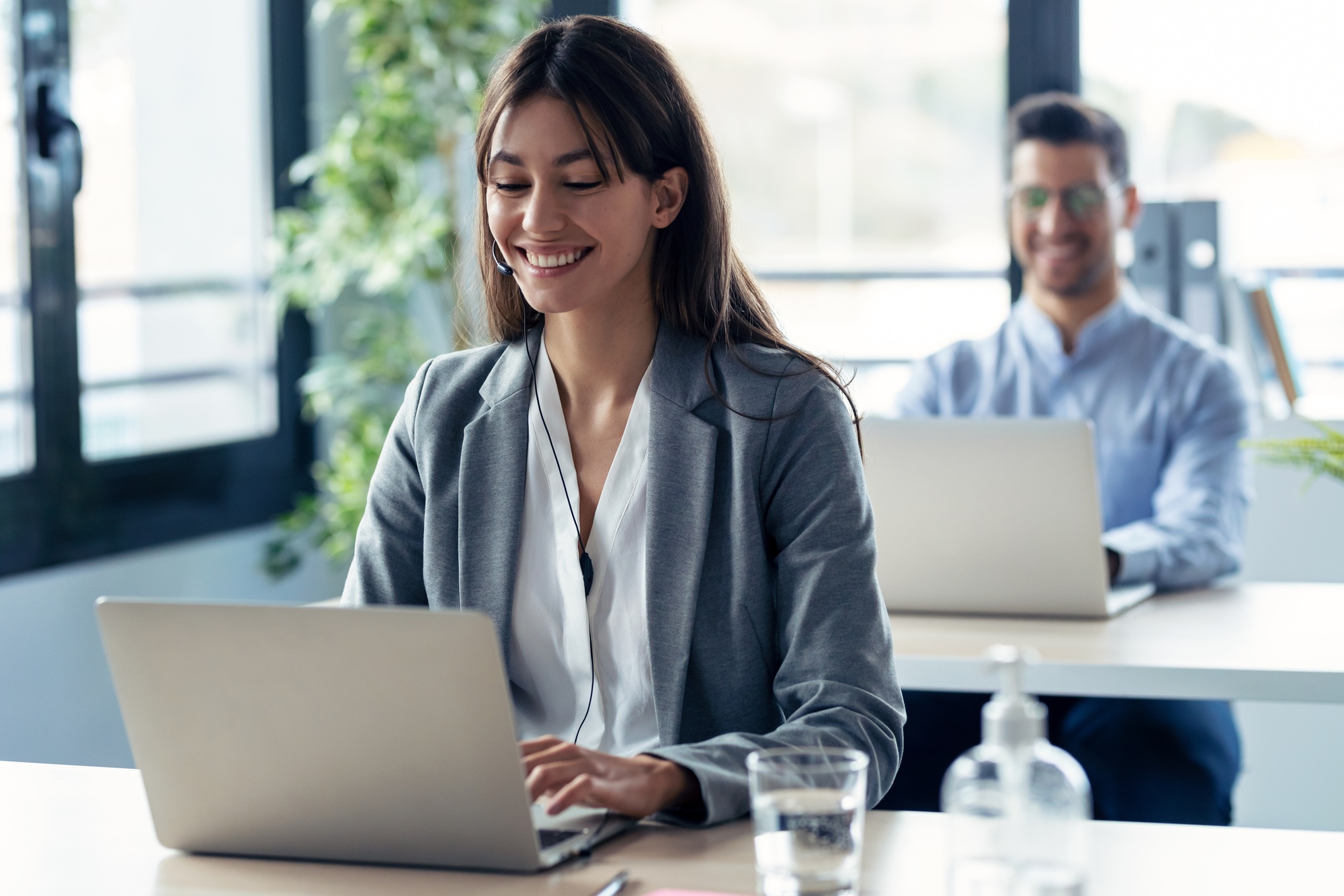 business team working while doing a video call  on online briefing with laptop