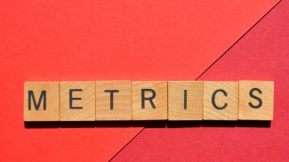 Metrics, word as banner headline