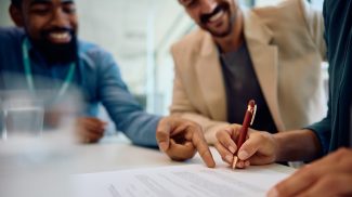 Signing a contract with insurance agent!