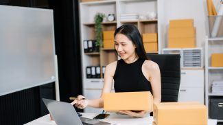 Small business entrepreneur SME freelance woman working at home office, BOX,tablet