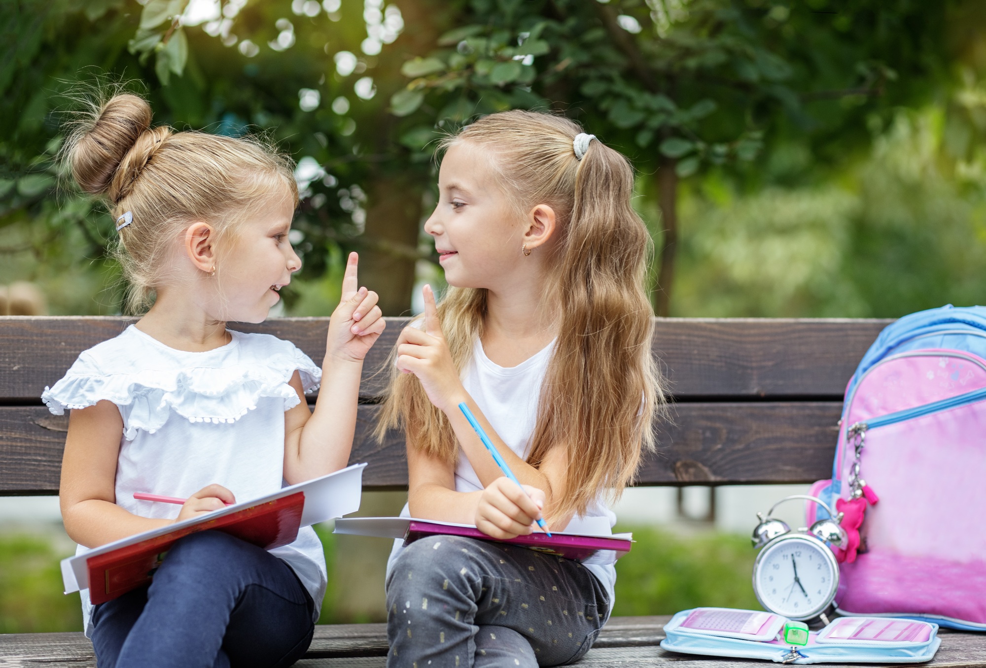 Smiling children invent ideas for drawing. The concept of school, study, education