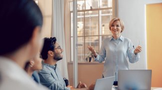 Team of business investors is discussing a new project in modern office. Concept of financing