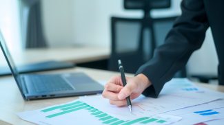 Top view of Documents with analytics data lying